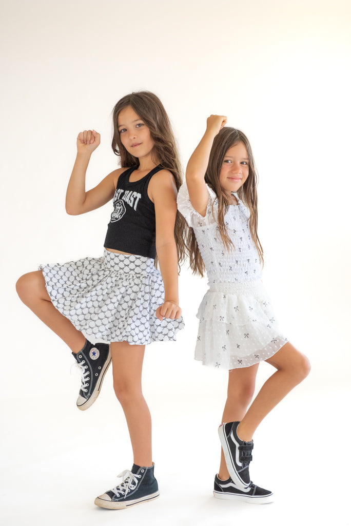 *Allover Bow Printed Smocked Top*